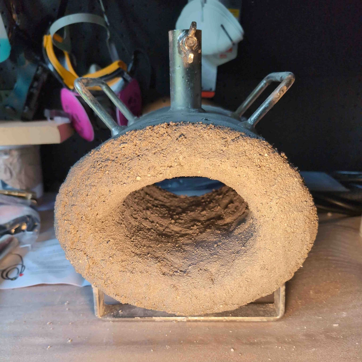 Smoother finish on the second coat of refractory cement.